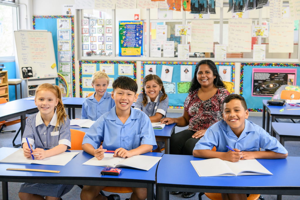 Children in classroom with teacher 